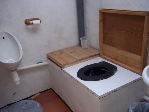 for those men who dont like to sit...a luxury compared with a bush in the rain!